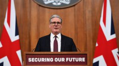 英首相称做好战斗准备 警告俄中挑战