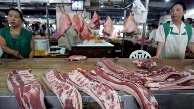 十一后 中国猪肉价格同比下跌近四成