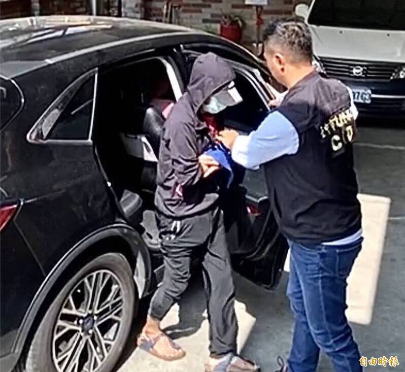 涉嫌纵火夺命的许男。（记者黄旭磊摄）